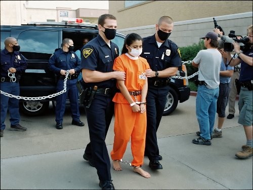 Passenger Charged with Capital Murder After Boyfriend's Shootout